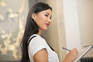 woman holding a checklist