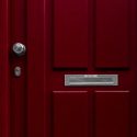 Red door close up of handle