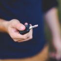 Man holding a car key