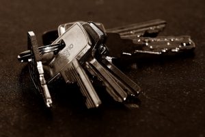 Several silver keys on a key ring