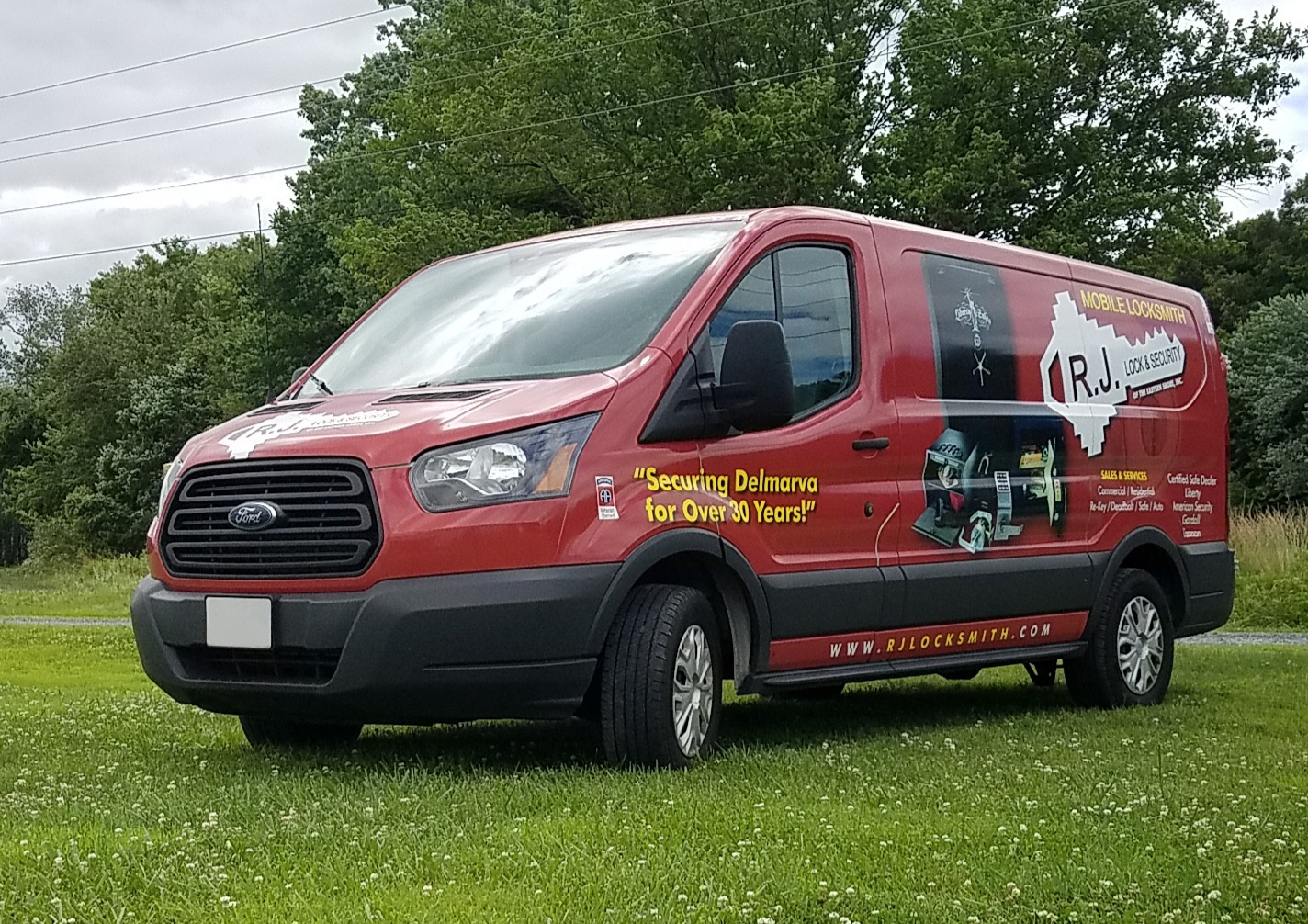 RJ Lock New red work van with logo on the side